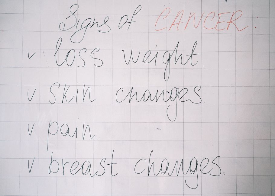 whiteboard with crossed out experiment list