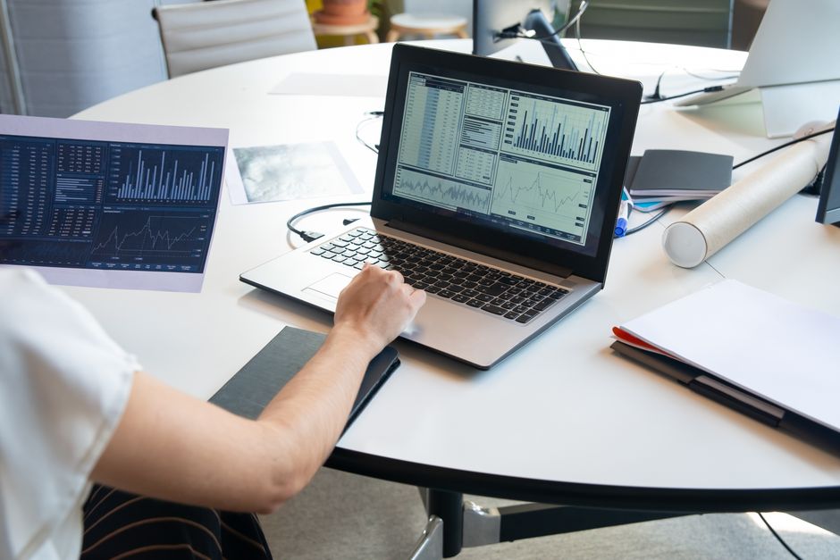 person annotating data on laptop screen