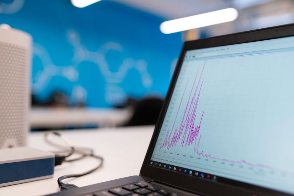 laboratory data charts on screen