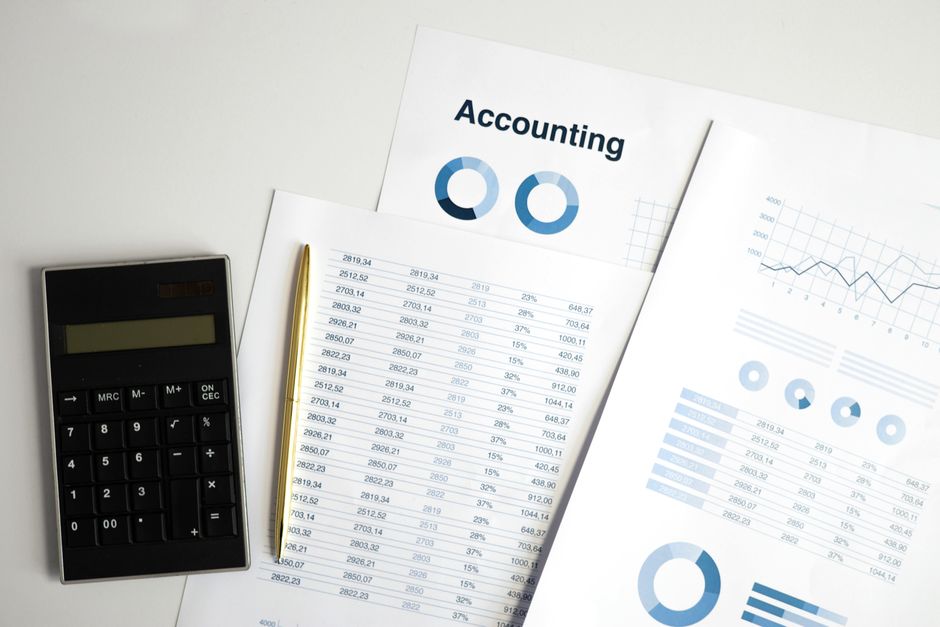 spreadsheet with financial figures on screen