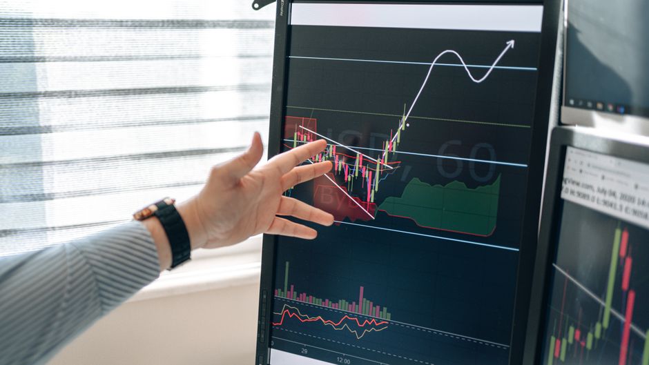 analyst looking at dashboard screens