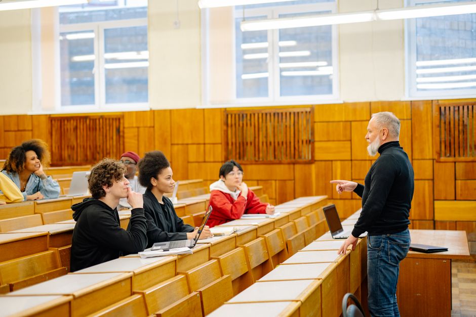 university lecture hall students laptops