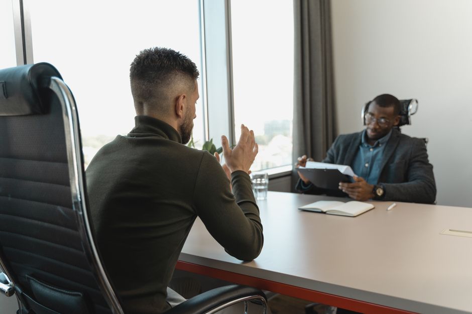 two people in job interview at table