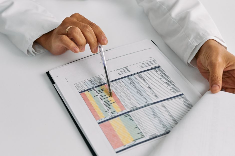 researcher reviewing data charts