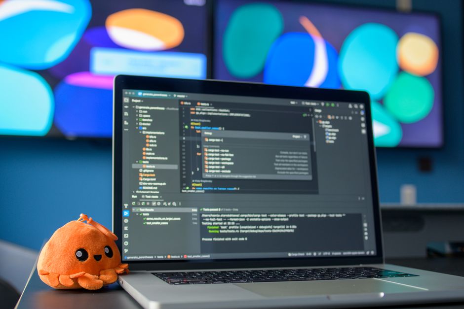 laptop screen with code editor