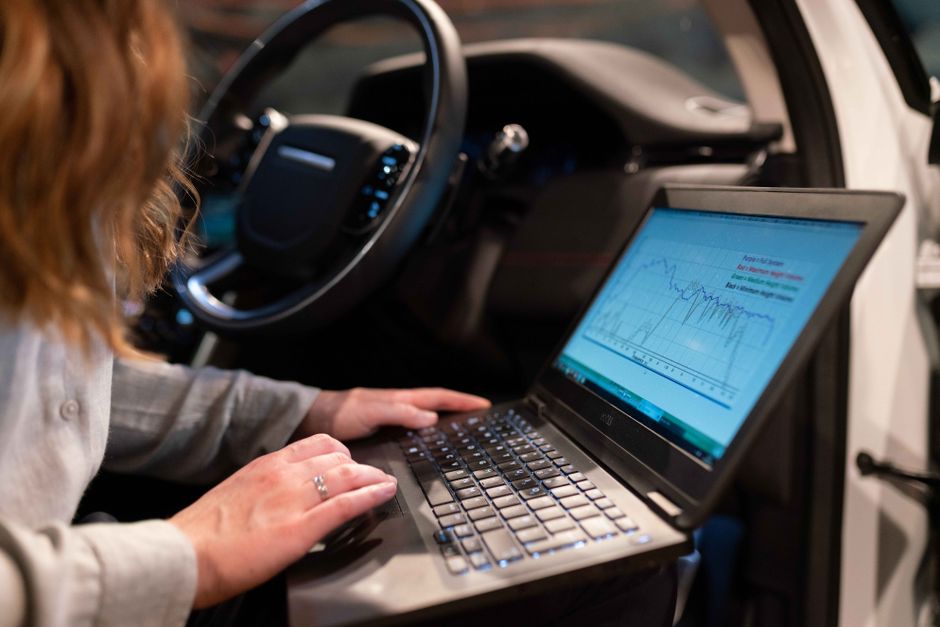 engineer looking at dashboard monitors