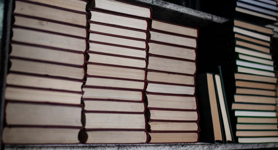 stacks of books on shelf