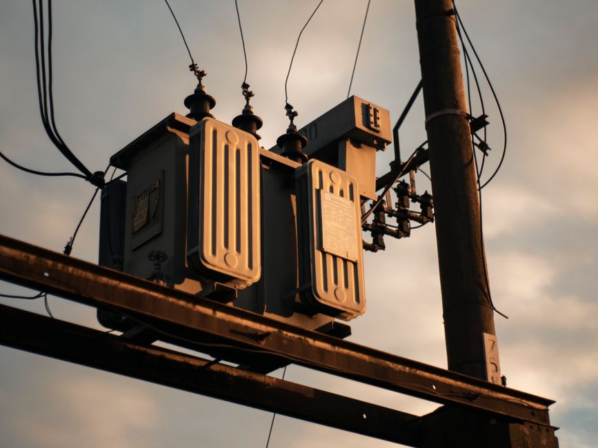 electrical power transformer on utility pole