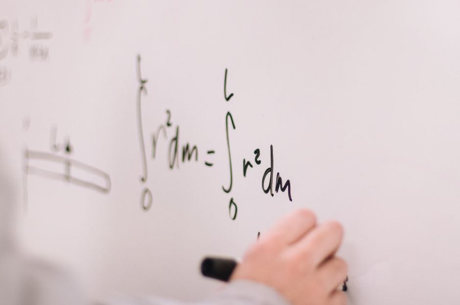 whiteboard with equations